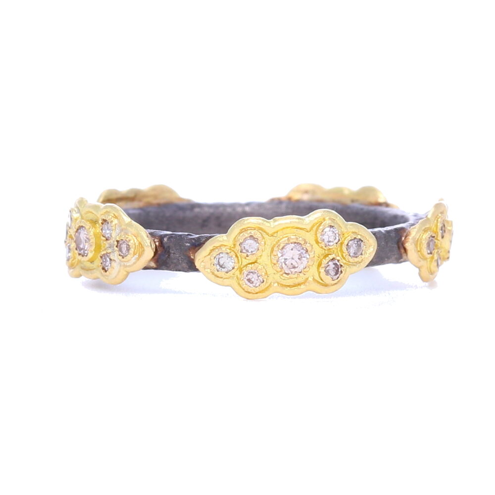 <div>This gorgeously unique ring features 5 oxidized sterling silver sculpted scrolls displaying set champagne diamonds. With a total carat weight of .245 carats, this ring is perfect stacked with others, or has enough personality to be worn alone. </div> Sculpted Scroll Diamond Stack Ring