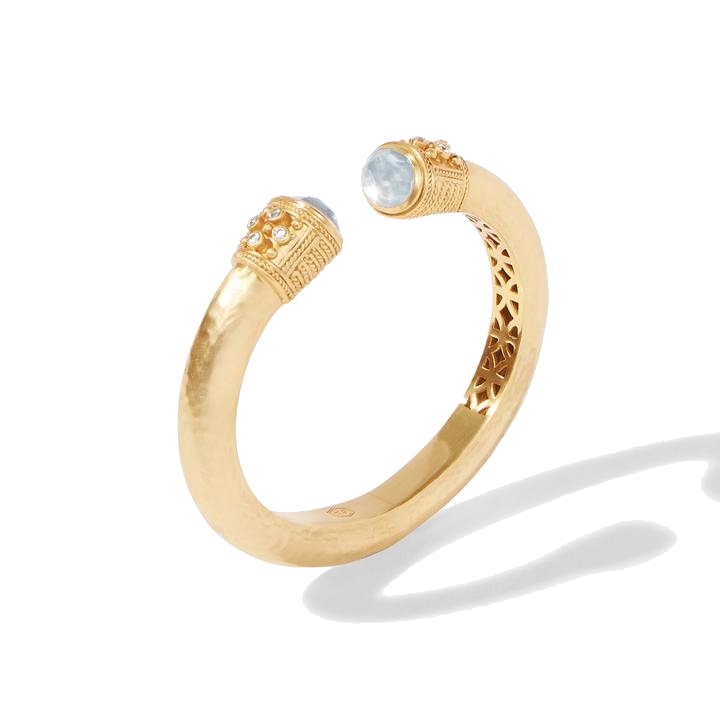 Radiant gemstone end caps of pacific blue gemstone, accented with sparkling freshwater pearls and rows of elegant chevron detail. Paris Demi Hinge Cuff