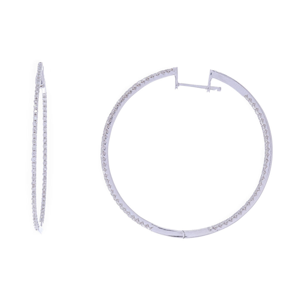 These 14k white gold round diamond hoop earrings are an essential staple to have in your jewelry collection. These thin hoops are stylish yet simple and are the perfect earring for all outfits! 14k White Gold Round Diamond Thin Hoops