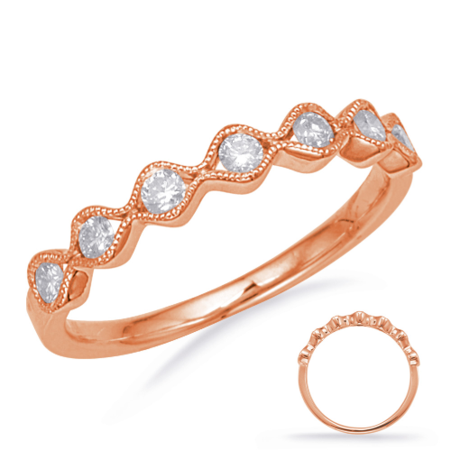This band is available in 14K Rose Gold. There are a total of 7 stones. There are round diamonds with a total carat weight of 0.27ct set in a Channel Set setting 14k Rose Gold Stack Band