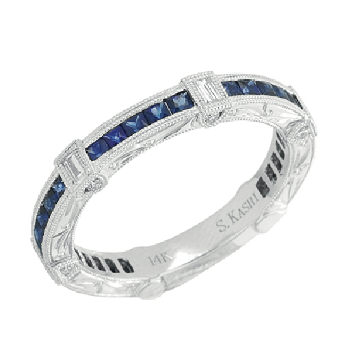 Available in 14K White Gold. There are a total of 37 stones. <div>There are baguette diamonds with a total carat weight of 0.12ct set in a Bezel Set / Channel Set setting. </div><div>There are round diamonds with a total carat weight of 0.08ct set in a Bezel Set / Channel Set setting. </div><div>There are sapphire diamonds with a total carat weight of 1.20ct set in a Bezel Set / Channel Set setting.</div> 14k Vintage Style Sapphire Band
