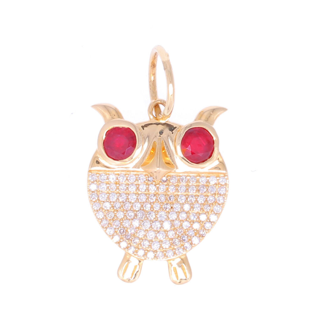 Hoot, Hoot! This adorable gold owl pendant handcrafted in 14K yellow gold features a diamond encrusted body and ruby eyes. Perfect by itself, or match it with other charms to create your own unique look.<div><ul><li>Diamond weight: 0.32ct</li><li>2 Faceted Rubies</li></ul></div> Owl Pendant with Ruby Eyes and Diamond Body
