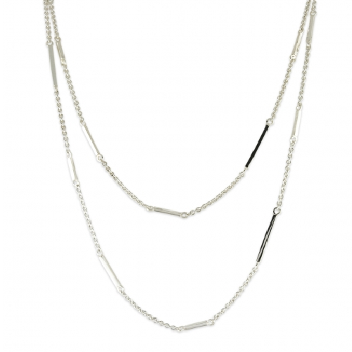 In 1989 Zina Sterling Silver moved into our Beverly Hills headquarters that accommodates our workshop as well as Zina 'The Store'. The store is a showcase for all that is 'today' in fine design in jewelry, gift ware, Judaica, frames and whatever Zina thinks is new and exciting that crosses her path. Zina is a destination for people seeking the finest in design . Zina is at the pulse of what is 'happening' Long Bar Station Chain Necklace
