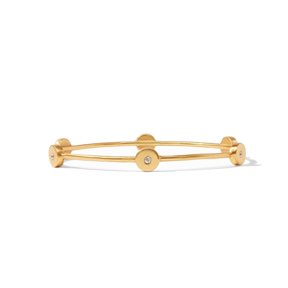 <div style="position: initial; margin: initial;">Slender bangle with with polished gold roundel stations that feature a Cubic Zirconia gemstone.</div><div style="position: initial; margin: initial;">Small - 7.5 inch circumference, 2.3 inch diameter</div><div style="position: initial; margin: initial;">Medium - 8 inch circumference, 2.5 inch diameter</div><div style="position: initial; margin: initial;">Large - 9 inch circumference, 3 inch diameter</div> Poppy Bangle size Medium