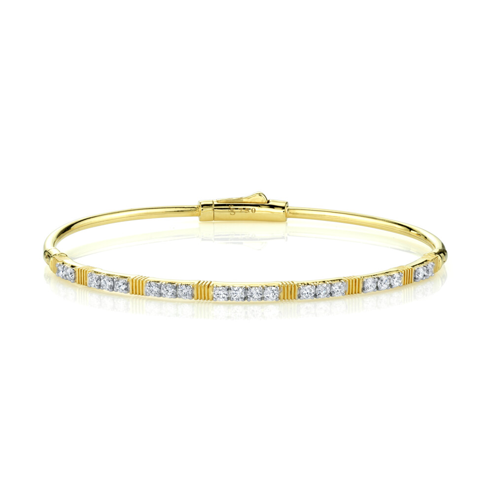 <div style="color: rgb(68, 68, 68); font-family: "Open Sans"; font-size: 11.9px; position: initial; margin: initial;">SLOANE STREET WHITE DIAMOND AND STRIE BRACELET FEATURES RICH STATIONS OF OUR SIGNATURE STRIE TEXTURE BROKEN UP BY INLINE SPARKLING WHITE DIAMONDS IN 18K YELLOW GOLD. THIS EFFORTLESSLY CHIC BRACELET IS A CLASSIC STAPLE FOR ANY WARDROBE AND EASY-TO-USE DOUBLE HINGE AND HIDDEN LOCKING CLASP ALLOWS FOR MAXIMUM VERSATILITY.</div><ul style="padding: 10px 20px 10px 30px; margin-block-end: 0px; margin-block-start: 0px; float: left; width: 440px; color: rgb(68, 68, 68); font-family: "Open Sans"; font-size: 11.9px; position: initial; margin: initial;"></ul> White Diamond Bracelet