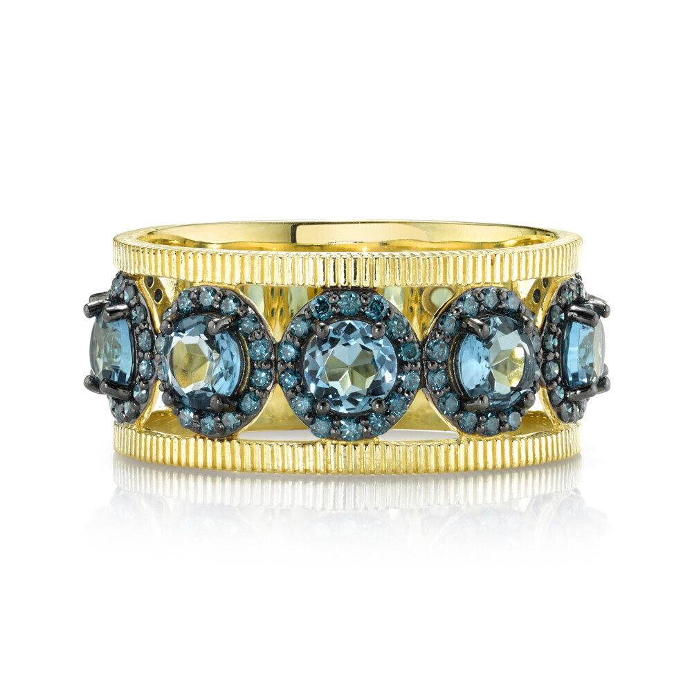 <span style="font-size: 16.8px; position: initial; margin: initial;">AS R008A, 8 X 4MM LONDON BLUE TOPAZ PRONG SET, SURROUNDED BY 1MM BLUE DIAMOND BLACK RHODIUM PRONG SET, 1.5MM STRIE AT EACH SIDE, SIZE 6.5, 18K-YG</span> London BLue and Blue Diamond Band with Strie Detail