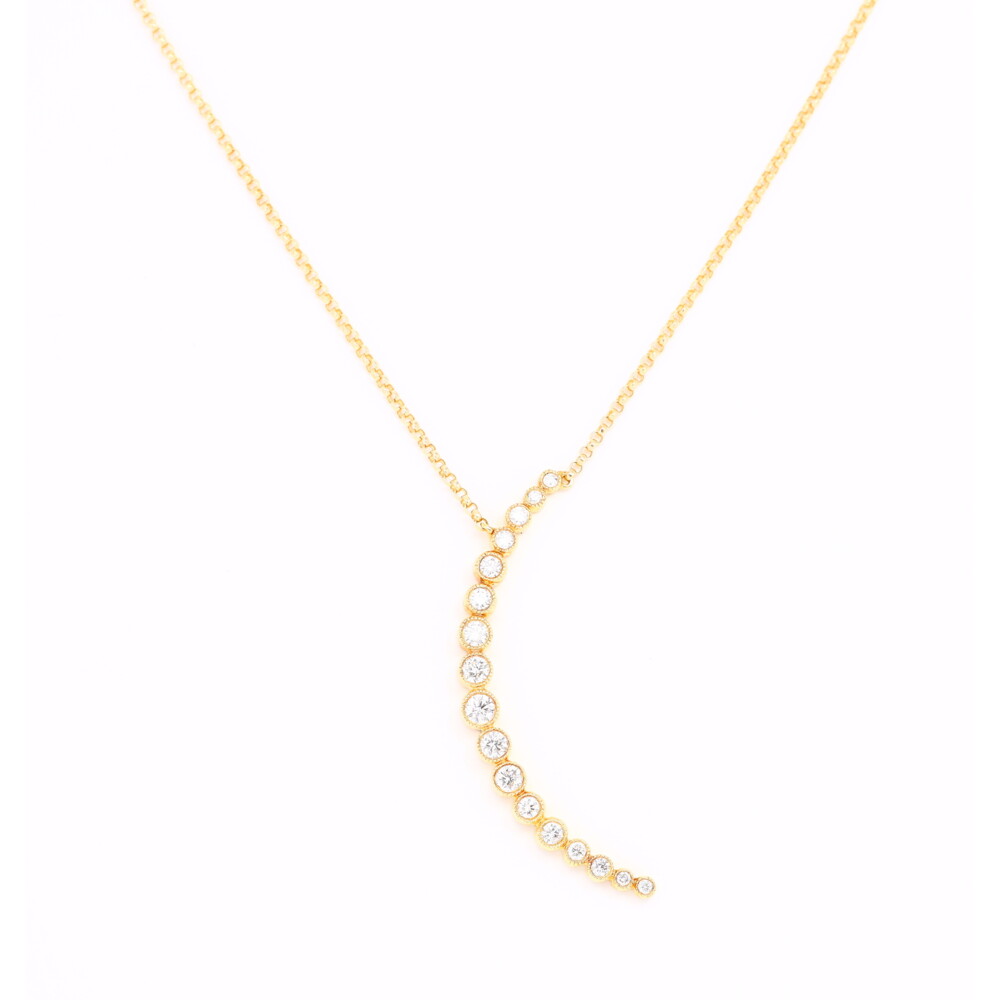 <div style="position: initial; margin: initial;">This stunning Bezel Set Crescent Diamond Pendant Necklace can add the perfect amount of uniqueness to your look. The 17 diamonds along the 14k yellow gold moon in a variety of sizes adds to the uniqueness of this piece. The focus on the moon in the pendant necklace is perfect for an everyday look or a night out. This 14k yellow gold diamond pendant necklace is a perfect balance of gold and diamonds. </div>14k YG - 3.52g
17 RD - 0.40tcw Bezel Set Crescent Diamond Pendant Necklace
