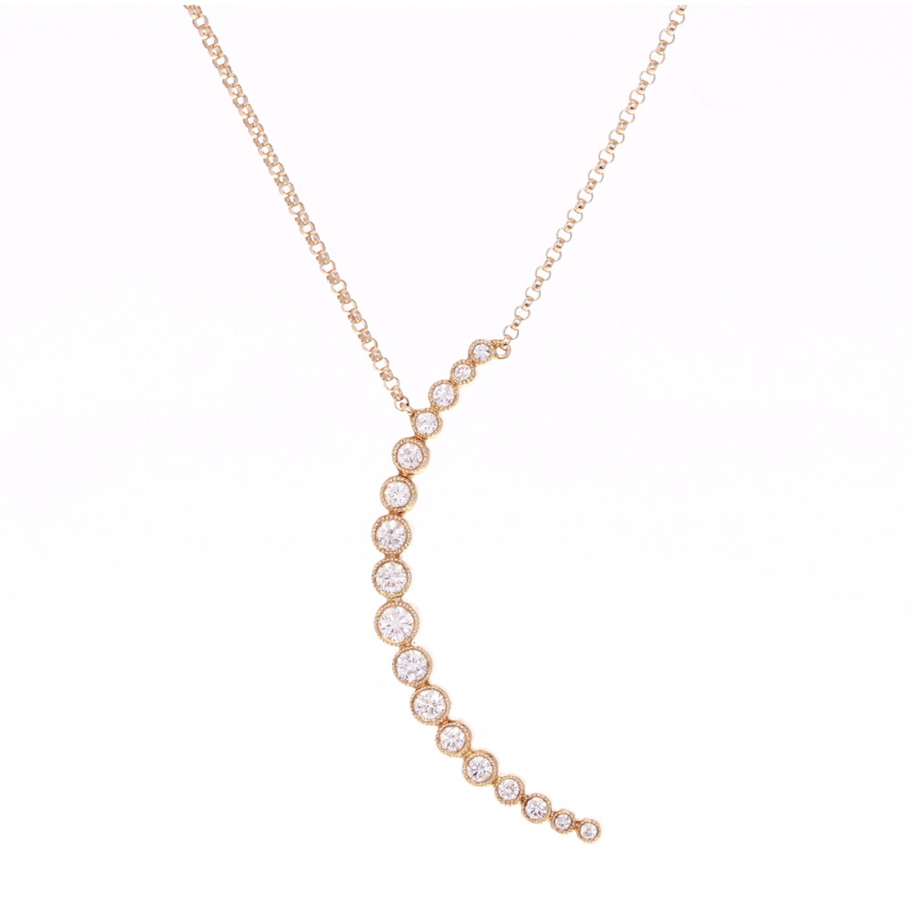 <div style="position: initial; margin: initial;">This stunning Bezel Set Crescent Diamond Pendant Necklace can add the perfect amount of uniqueness to your look. The 17 diamonds along the 14k yellow gold moon in a variety of sizes adds to the uniqueness of this piece. The focus on the moon in the pendant necklace is perfect for an everyday look or a night out. This 14k yellow gold diamond pendant necklace is a perfect balance of gold and diamonds. </div>14k YG - 3.52g
17 RD - 0.40tcw Bezel Set Crescent Diamond Pendant Necklace