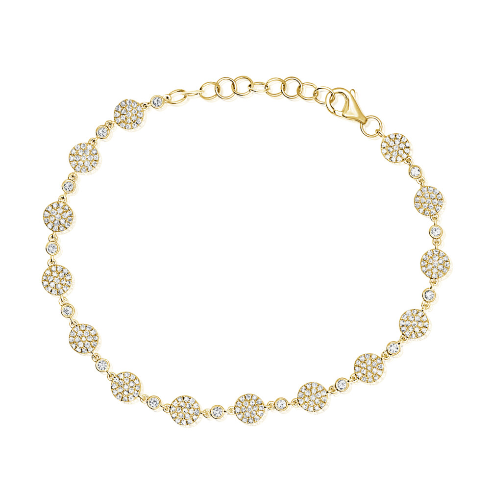 The beautiful 14k yellow gold Pave Diamond Disk Bracelet pairs well with any look. The simple yet beautiful design makes this Pave diamond disk bracelet look effortless. This bracelet works well for an everyday look or a big night out. The beautiful Pave diamond disks look perfect with the 14k yellow gold chain connecting the pave diamond disks. <div><br></div><div>14k YG - 3.98g
14 RD - 0.23tcw
266 SC - 0.77tcw</div> Pave Diamond Disk Bracelet