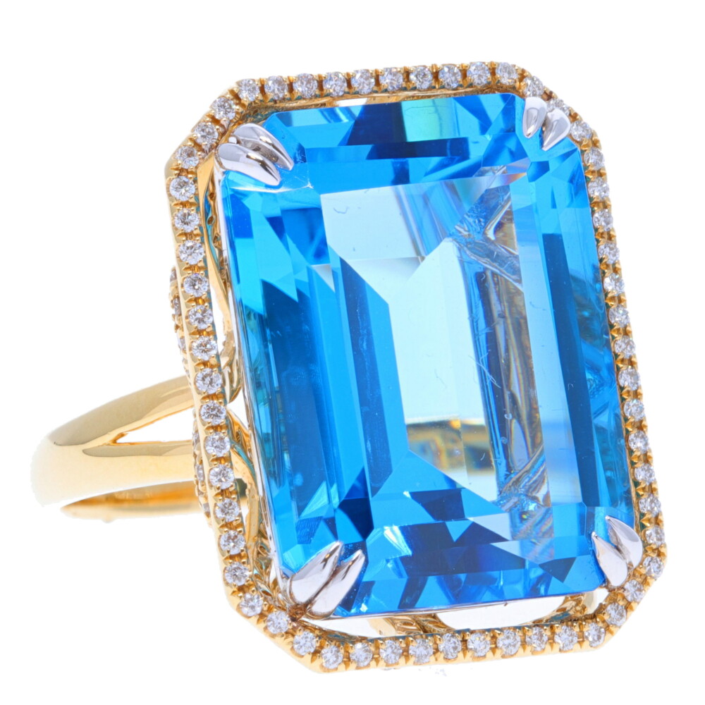 18k Yellow and White Gold Diamond and Swiss Blue Topaz Ring
18k: 8.17g
DIA: 0.73tcw
Topaz: 24.05ct 18k Emerald Cut Swiss Blue Topaz with Diamond Halo