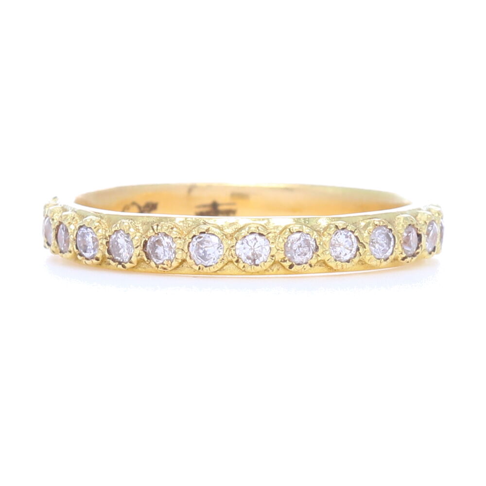 <div>This beautiful matte 18k yellow gold ring features 45 1.7mm white diamond baguettes, with a total weight of .54 carats. This ring is perfect to stack with others, or has enough personality to wear alone.</div> White Diamond Stack Ring