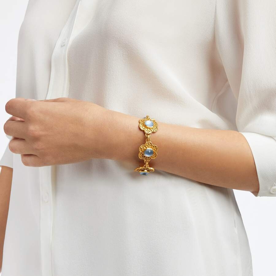 <div style="position: initial; margin: initial; font-family: Lanae;">Opulent gemstone flowers decorated with raised bead detail. Double toggle rings for adjustable length.</div><div style="position: initial; margin: initial; font-family: Lanae;"><br style="position: initial; margin: initial; font-family: Lanae;"></div><div style="position: initial; margin: initial; font-family: Lanae;"><ul><li>24K gold plate</li><li>Adjustable length 7 - 7.5 inches</li><li>Imported glass, mother of pearl</li><li>Julie Vos hallmark</li></ul></div> Colette Bracelet