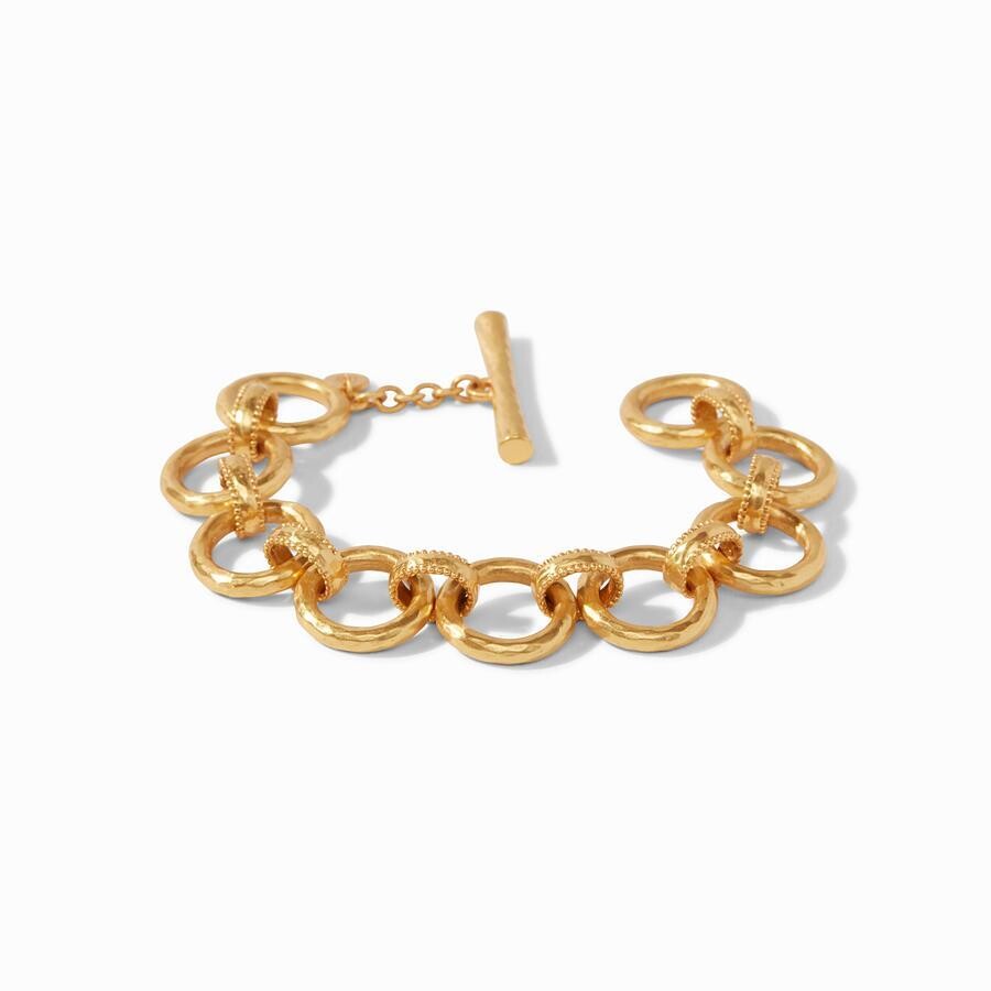 <div style="position: initial; margin: initial; font-family: Lanae;"><span style="font-family: Lanae; font-size: 1.2rem;">Lightly hammered links decorated with raised bead detail. Toggle closure.</span><br style="font-family: Lanae;"></div><div style="position: initial; margin: initial; font-family: Lanae;"><br style="position: initial; margin: initial; font-family: Lanae;"></div><div style="position: initial; margin: initial; font-family: Lanae;"><ul><li>7.5 - 8 inch length</li><li>24K gold plate</li><li>Julie Vos hallmark</li></ul></div> Savoy Demi Link Bracelet