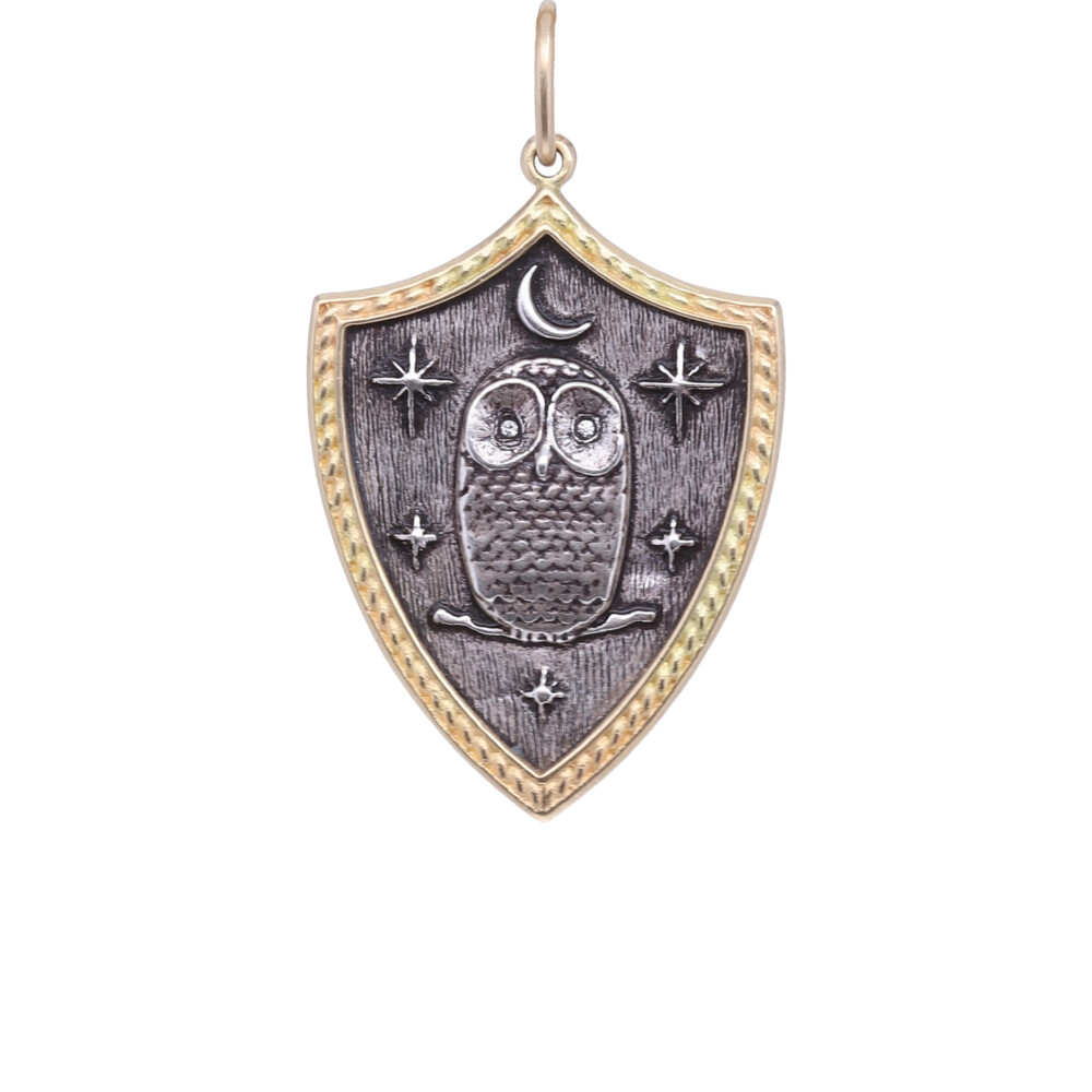 <div style="position: initial; margin: initial;">Large 18k & Blackened Sterling Silver Sheild with an Owl with Diamond Eyes, The Moon & Stars, on the revers in Italian it reads <span style="font-family: inherit; font-size: 1.2rem;">"Dve Strade Diveredged in vn bosco e ho preso la meno battvta" which translates to "</span><font face="inherit"><span style="font-size: 1.2rem;">Two roads </span></font>diverged<font face="inherit"><span style="font-size: 1.2rem;"> in a wood and I took the one less traveled by" - Robert Frost</span></font></div> 18k Owl Shield Charm with Diamond Eyes Pendant