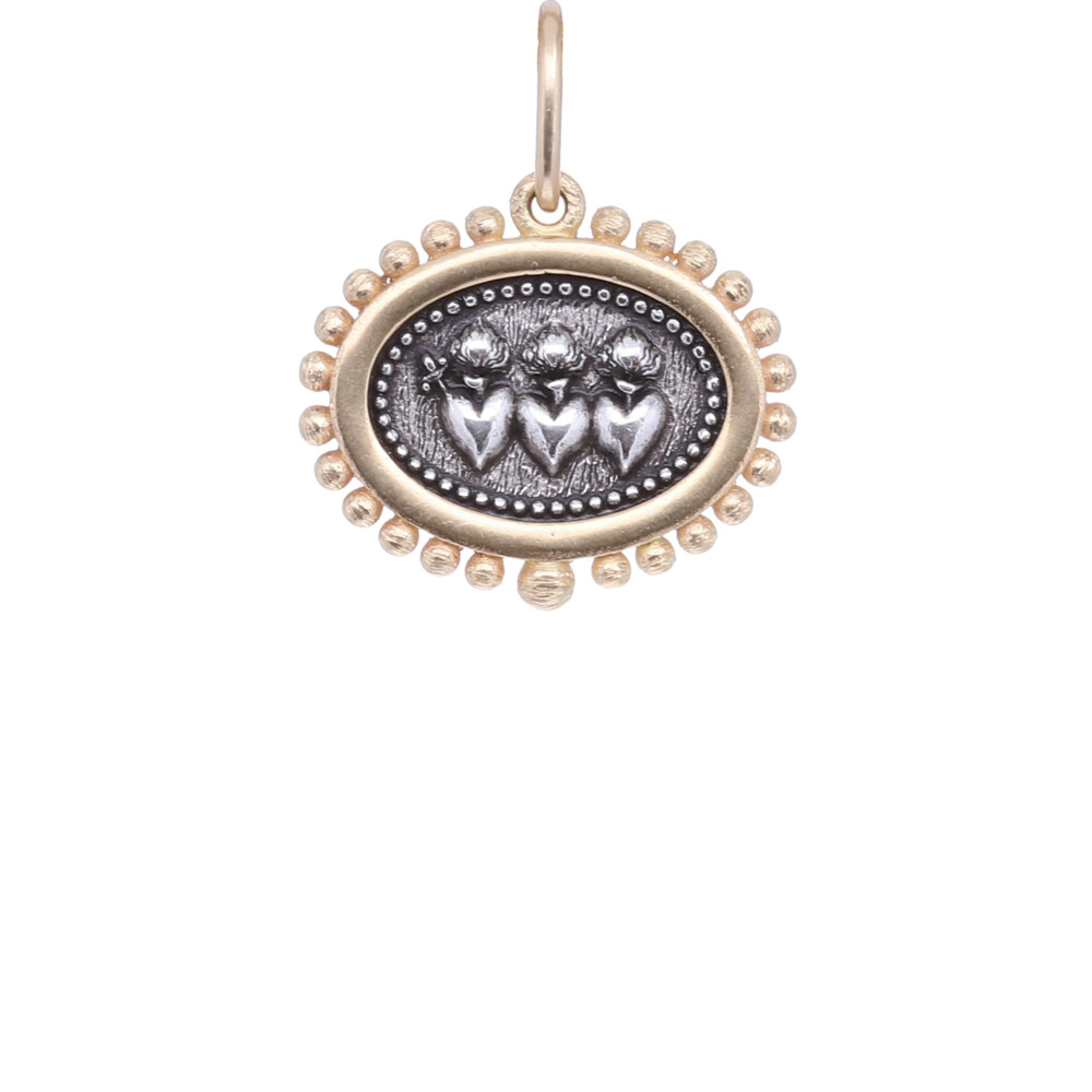 <span style="color: rgb(0, 0, 0); font-size: medium; position: initial; margin: initial;">18k & Sterling Silver Triple Sacred Heart with additional heart on reverse.</span> 18k Triple Sacred Heart Oblong Charm Pendant