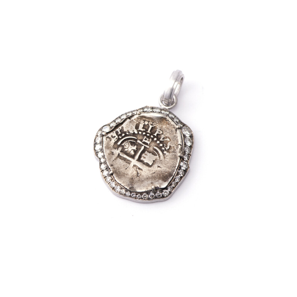 Ship Wreck Spanish Coin Circa: 1621-1665
18k White Gold
Single Cut Diamond Approx: 1.20tcw
Ship Wreck Coin from Spanish Colonial Empire
Reign of Phillip IV Circa 1621-1656
Size: 2"W x 1 1/2"L Ship Wreck Spanish Coin Pendant