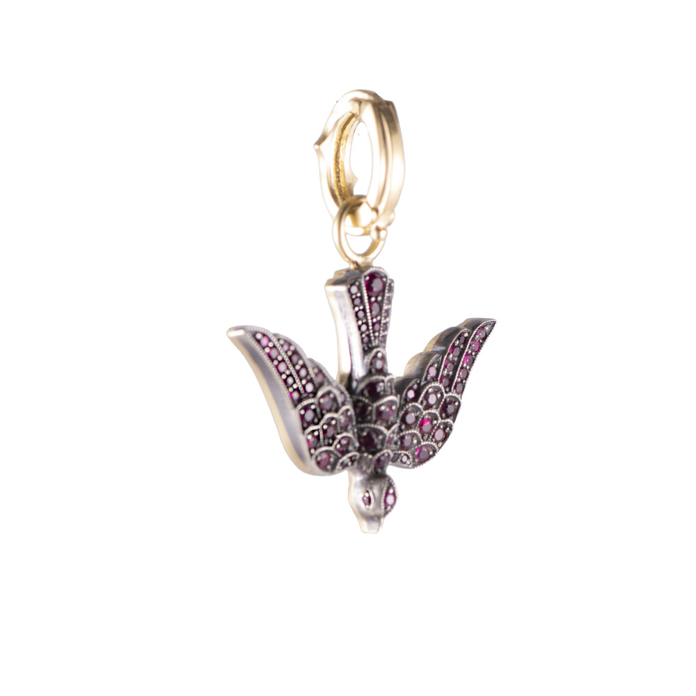 Ruby Swallow Pendant
18k Yellow Gold/Sterling Silver Oxidized
Ruby Approx: 0.70tcw
Size: 1 1/8"W x 1 7/8"L Ruby Swallow Pendant