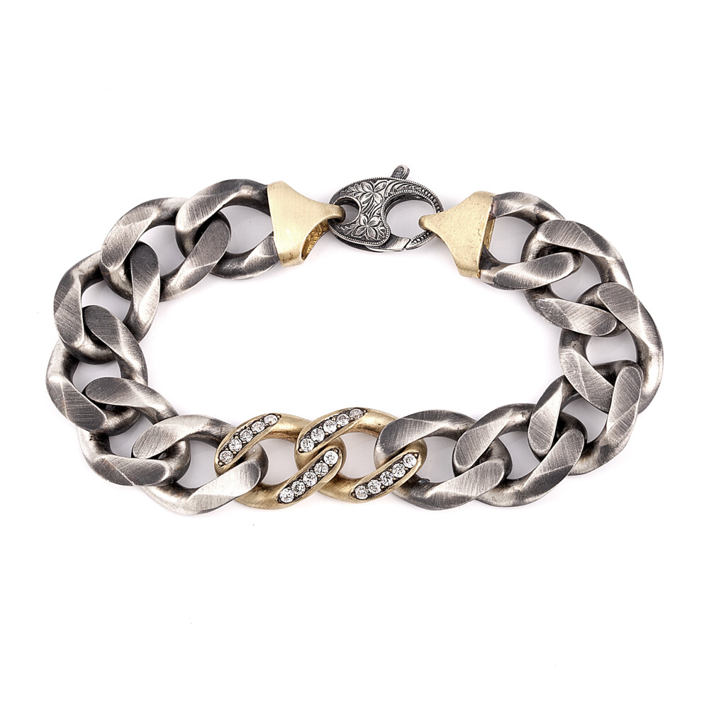 18kt Yellow Gold / Sterling Silver Oxidized
Round Brilliant Cut Diamond Approx: 0.74tcw
Size: 7 1/2" 2 Tone Link Bracelet