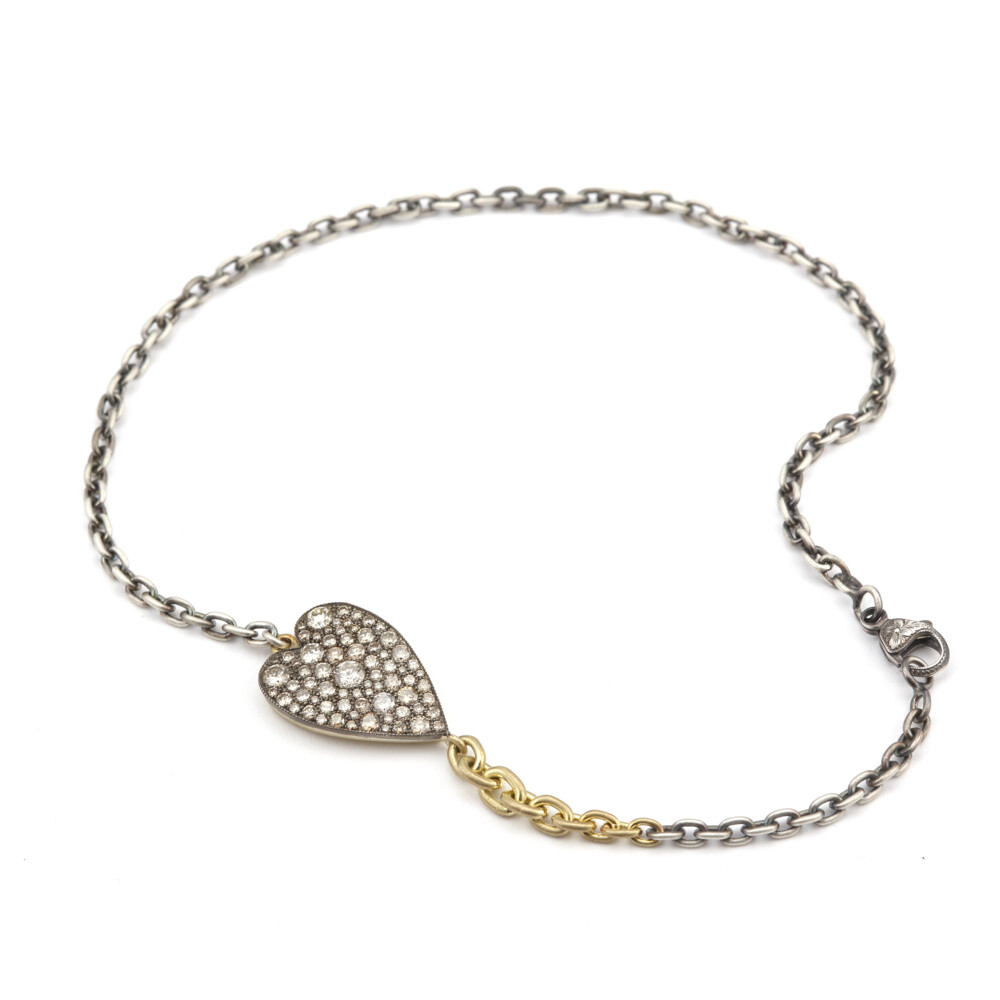 18k Yellow Gold / Sterling Silver Oxidized
Champagne Diamond Approx: 2.66tcw
Size: 14"
Total Gram: 20.70g
Made In The USA Champagne Heart Ten Table Double Wrap Bracelet