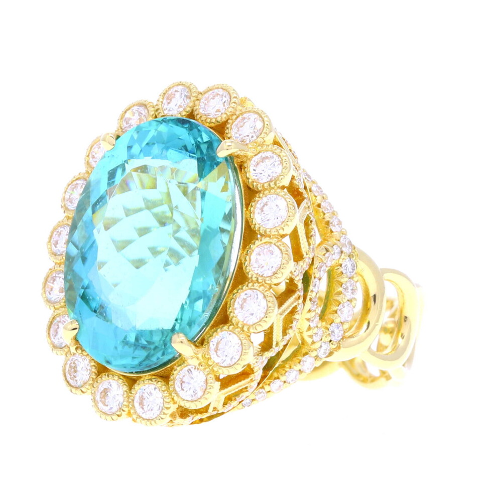 18k yellow gold Easter Egg ring featuring a 15.05tcw oval blue tourmaline center with 1.86tcw diamond accents (134 stones), ring size 7.5 with speed bumps added Easter Egg Ring