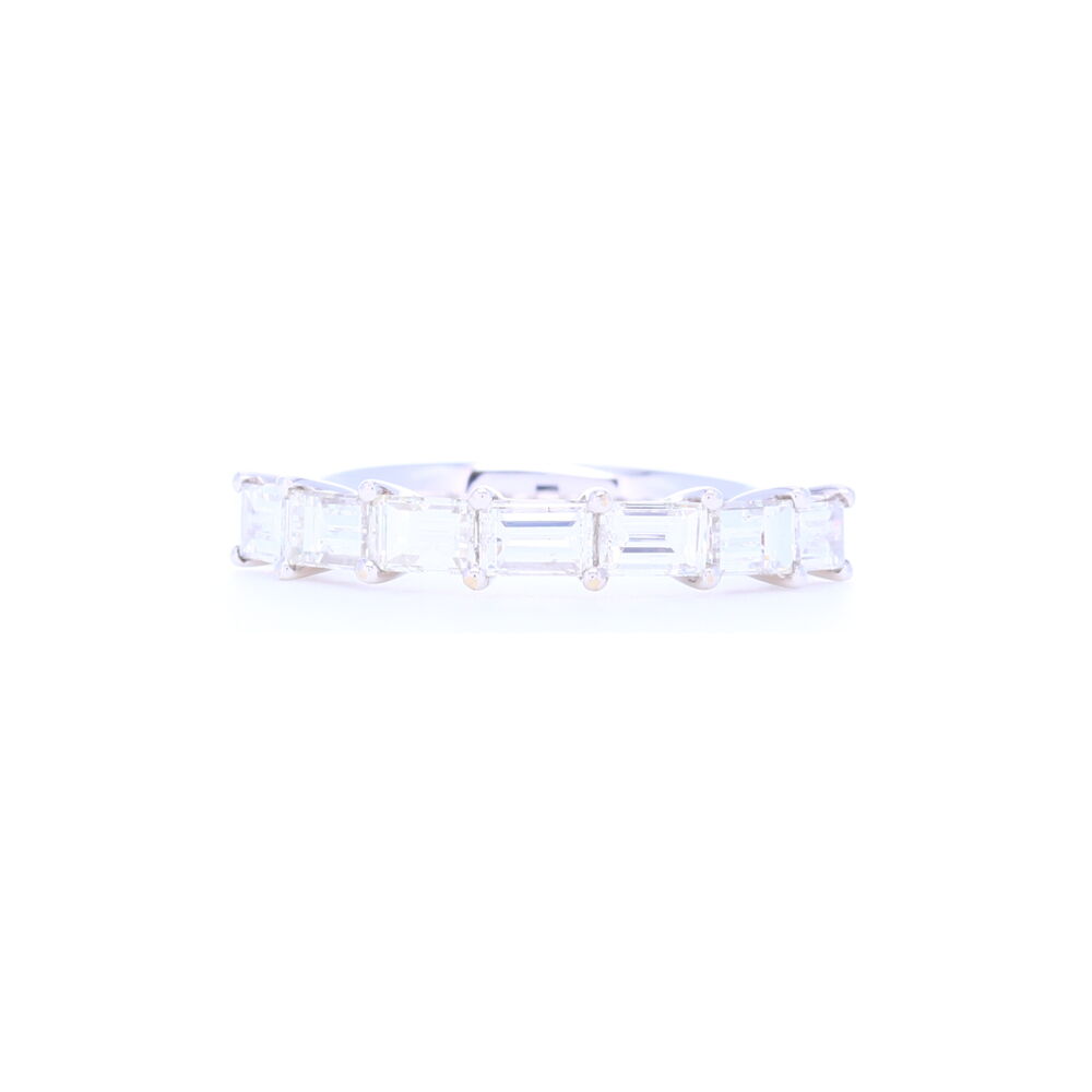 Uniquely set baguette diamonds give this 18k white gold stacking ring a signature sophisticated look. Eye clean diamonds totaling 1.78 carats and sleek shared prong setting make this a classic you'll wear for years.<div>Diamond weight: 1.78ct</div> 18k White Gold Side Set Baguette Diamond Stack Ring