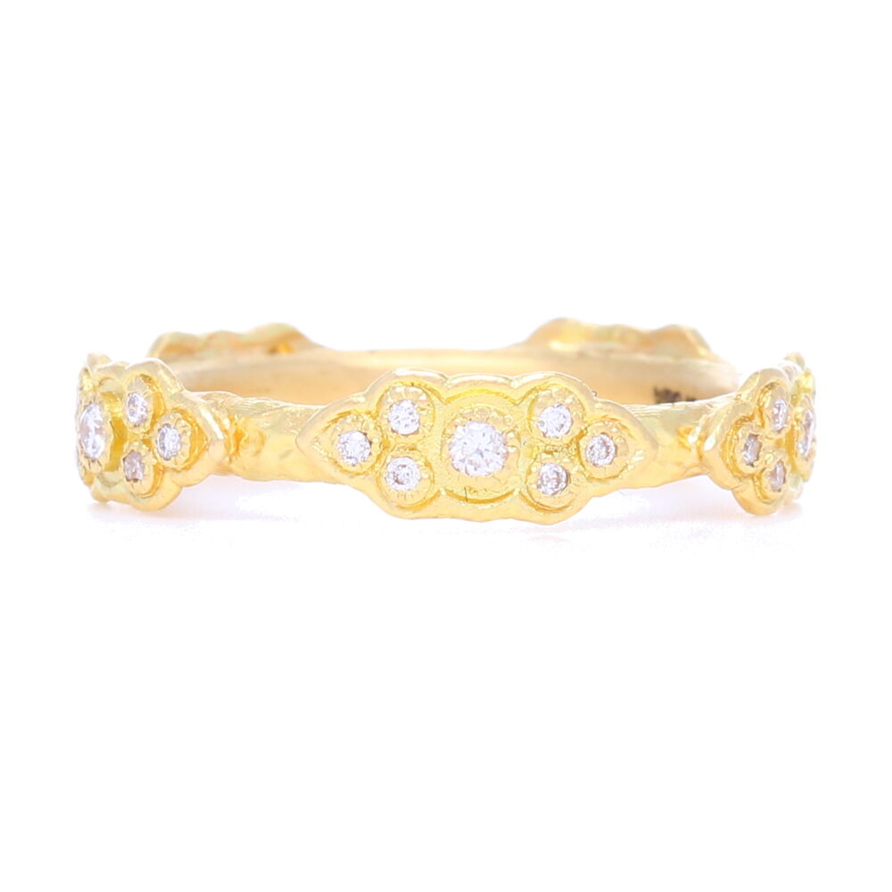 <div>This beautiful matte 18k yellow gold ring displays 5 sculpted scrolls, each exhibiting 7 diamonds. This rings total diamond weight is .22 carats, and is perfect to stack with others. But has enough dimension and flair to stand out on its own. </div> Sculpted Scroll Diamond Stack Ring