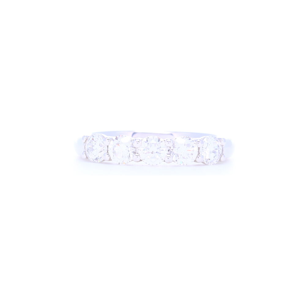 <font size="2">Sometimes less is more, and that's our thoughts on this ring. Less diamonds but bigger in size, this ring is crafted using 4.09 grams of 18k white gold and 1.07 carats of diamonds. The diamonds are beautiful, full of sparkle and bright white. Doesn't go 1/2 way around but what it gains in less stones, is more bling in size and more comfort in wearing. </font><div><font size="2">Diamond weight: 1.07ct</font></div> 18k White Gold 5 Stone Brilliant Cut Diamond Stack Ring