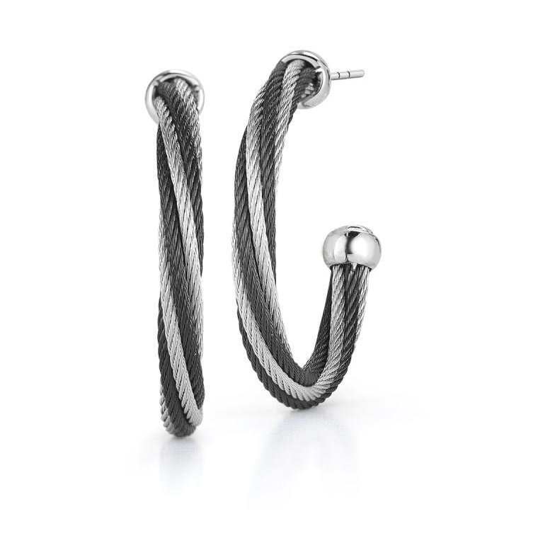 Simple and elegant. These two toned hoops are nice and lightweight, great for an everyday all day earring. Made from Alor's patented heat treated steel cable, the color goes through the entire piece and will never come off.<div><br></div><div><ul><li>Available in in Grey/Yellow, Grey/Black, and Black/Gold</li><li>18k Post and Cap</li><li>Lightweight</li></ul></div> Twisted Two Tone Cable Hoop Earrings