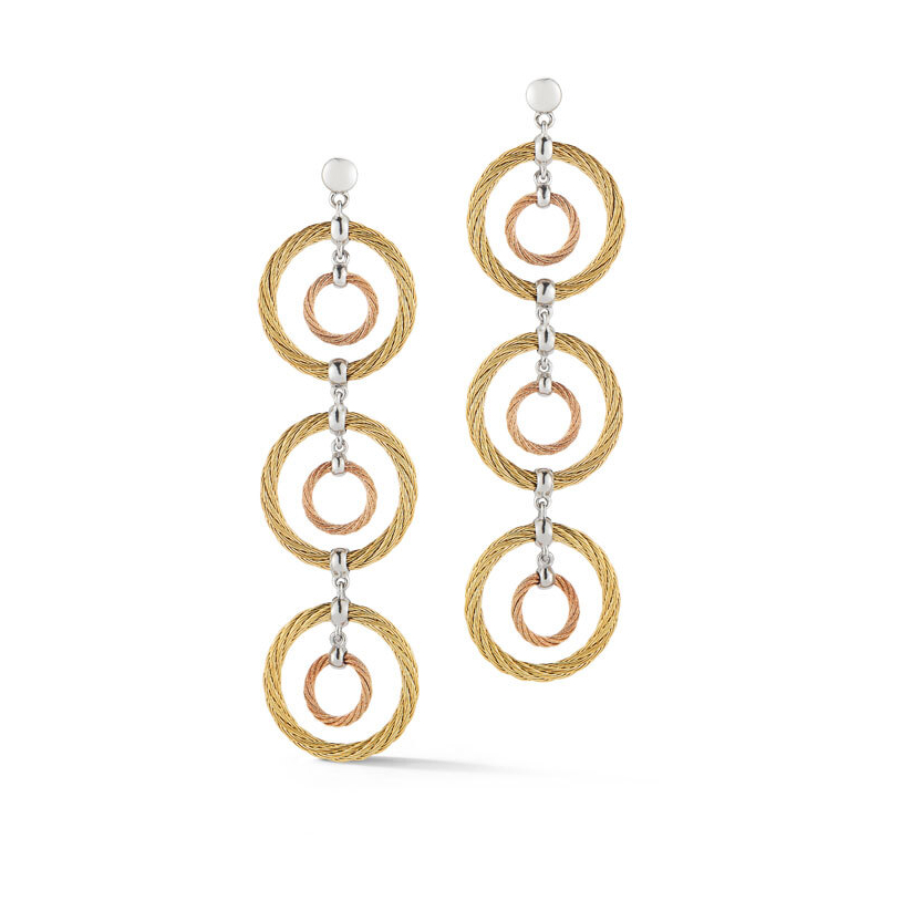 These triple drop earrings by Alor have been created with their patented heat treated steel cable combined with 18k gold to create a big high quality statement earring at a low cost.<div><br></div><div><ul><li>Available in Grey/Yellow, Black, and Yellow</li><li>18k Gold Post and Findings</li><li>Lightweight</li></ul></div> Triple Drop Cable Earrings