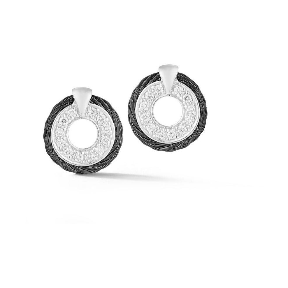 These stud earrings feature a strand of heat treated black colored steel cable creating a border around an 18k white gold diamond station. These earrings are perfect for as a stand alone earring or layer it up with a second piercing.<div><br></div><div><ul><li>Available in Black</li><li>18k Gold Post and Settings</li><li>0.20tcw of Diamond</li></ul></div> Circle Diamond Stud Cable Earrings