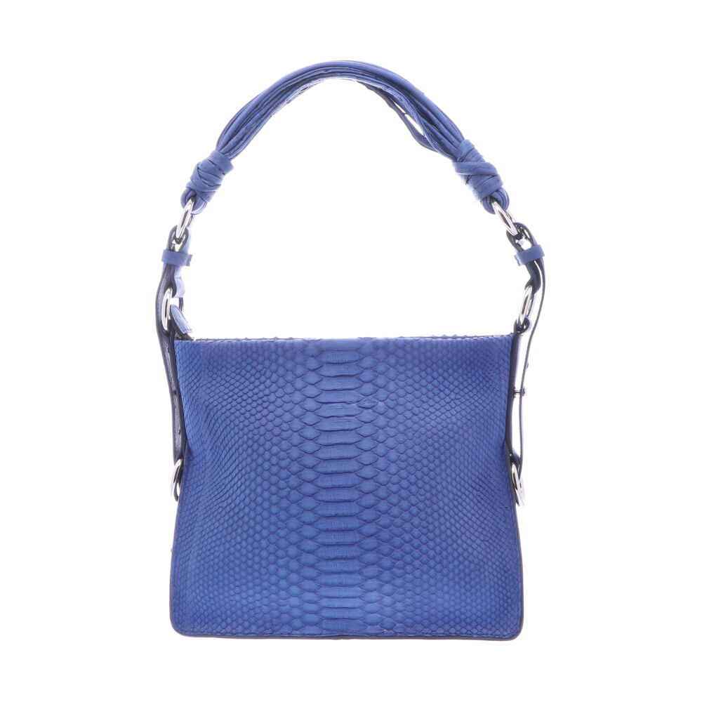LaNae’s Amanda Over the Shoulder Handbag is made of genuine python skin. Proudly handcrafted in the USA by 3rd generation artisans, all edges are hand painted, interior is garment suede and is detailed with Italian palladium hardware. The interior is complete with one zippered and one large open pockets. The strap drop is 10”. Each luxury bag is one of a kind and especially made just for you. Contact the store today for more photos.
Royal Blue Python Shoulder Bag With Royal Blue Ostrich Trim