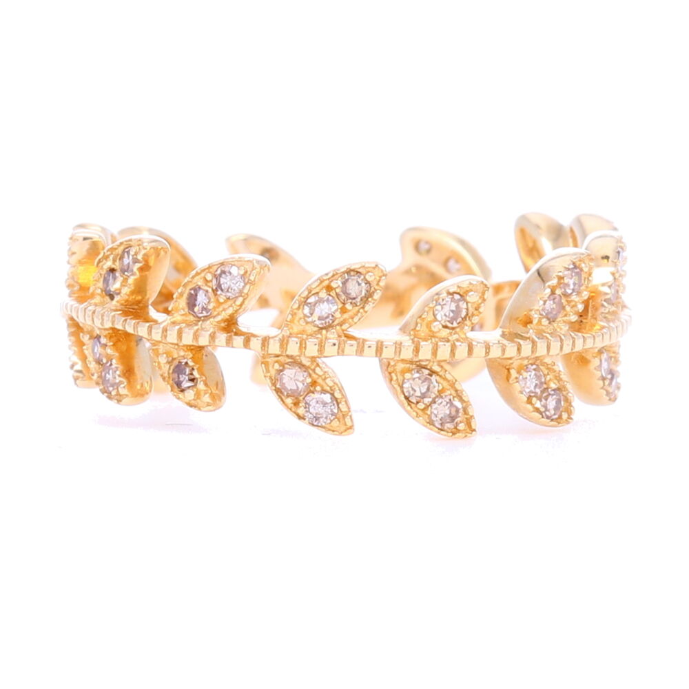 One of our best sellers, this ring gives you just enough width, negative space, and sparkle for a killer price to be the shining star of your stack. Pairs with nearly every other ring and comes in all 3 colors, this will be your favorite. Meant to mimic an actual vine, it is whimsical and stylish. Order a half-size up for this if you want to pair it with others. Wider rings when stacked together will be more comfortable if ordered slightly larger. 14k Gold Vine Eternity Band/Stack Ring
