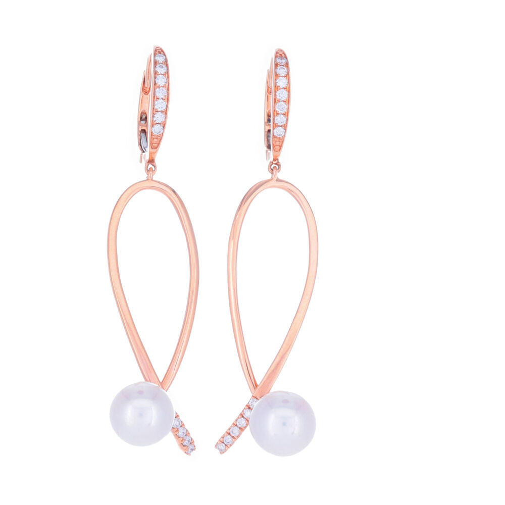 <font size="2">These 18k rose gold diamond pearl earrings are as elegant as they are sophisticated. These unique earrings have .27 carats of diamonds and two beautiful freshwater pearls, both flowing perfectly into one another like the sea.</font><div><font size="2">Diamond weight: 0.27ct</font></div> 18k Rose Gold Diamond Pearl Earring