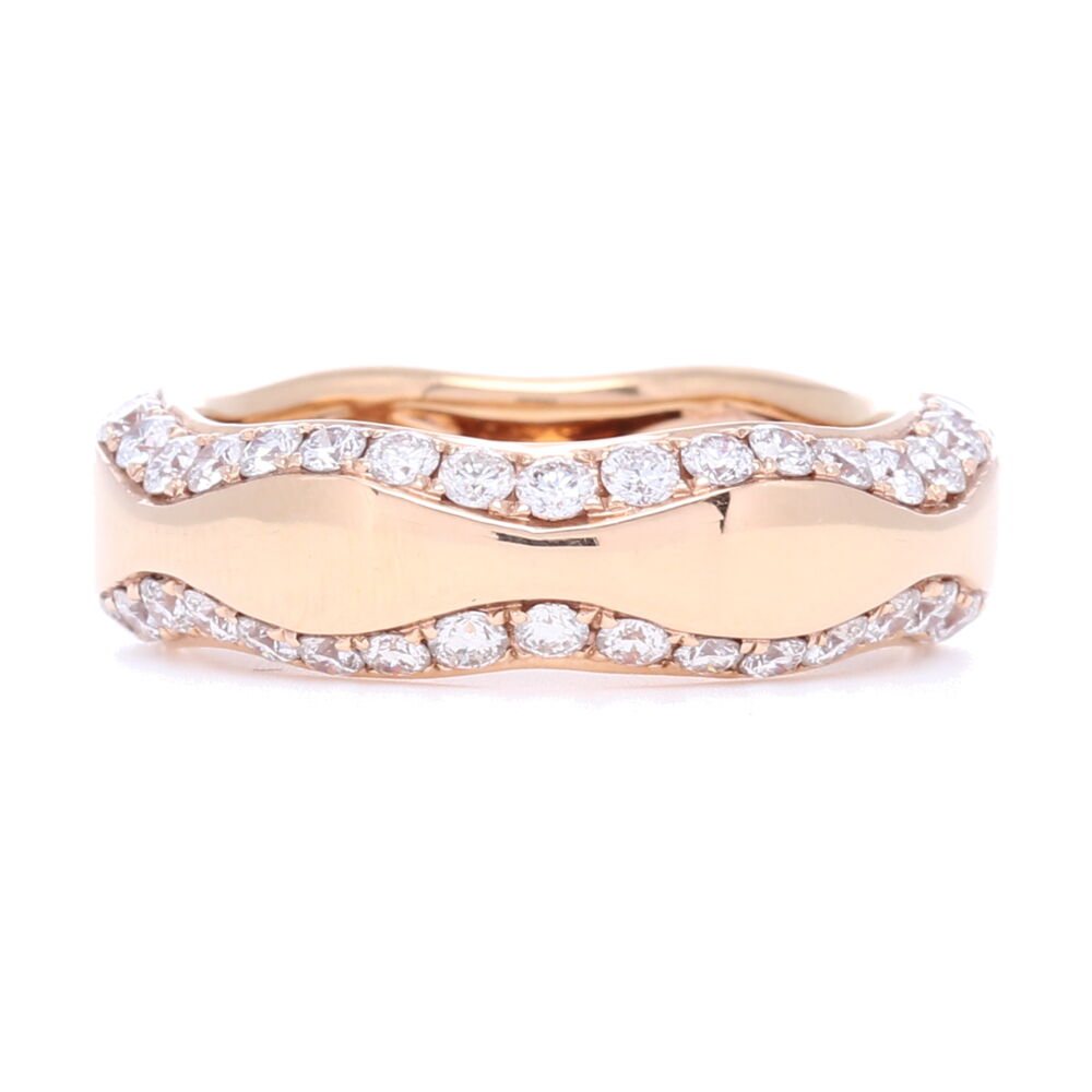 This 18k rose gold diamond ring is unique as it resembles waves of the ocean. With .99 carats of diamonds, this size 7 beautiful and elegant ring is bound to make waves to all that see it. 18k Rose Gold Wave Diamond Ring