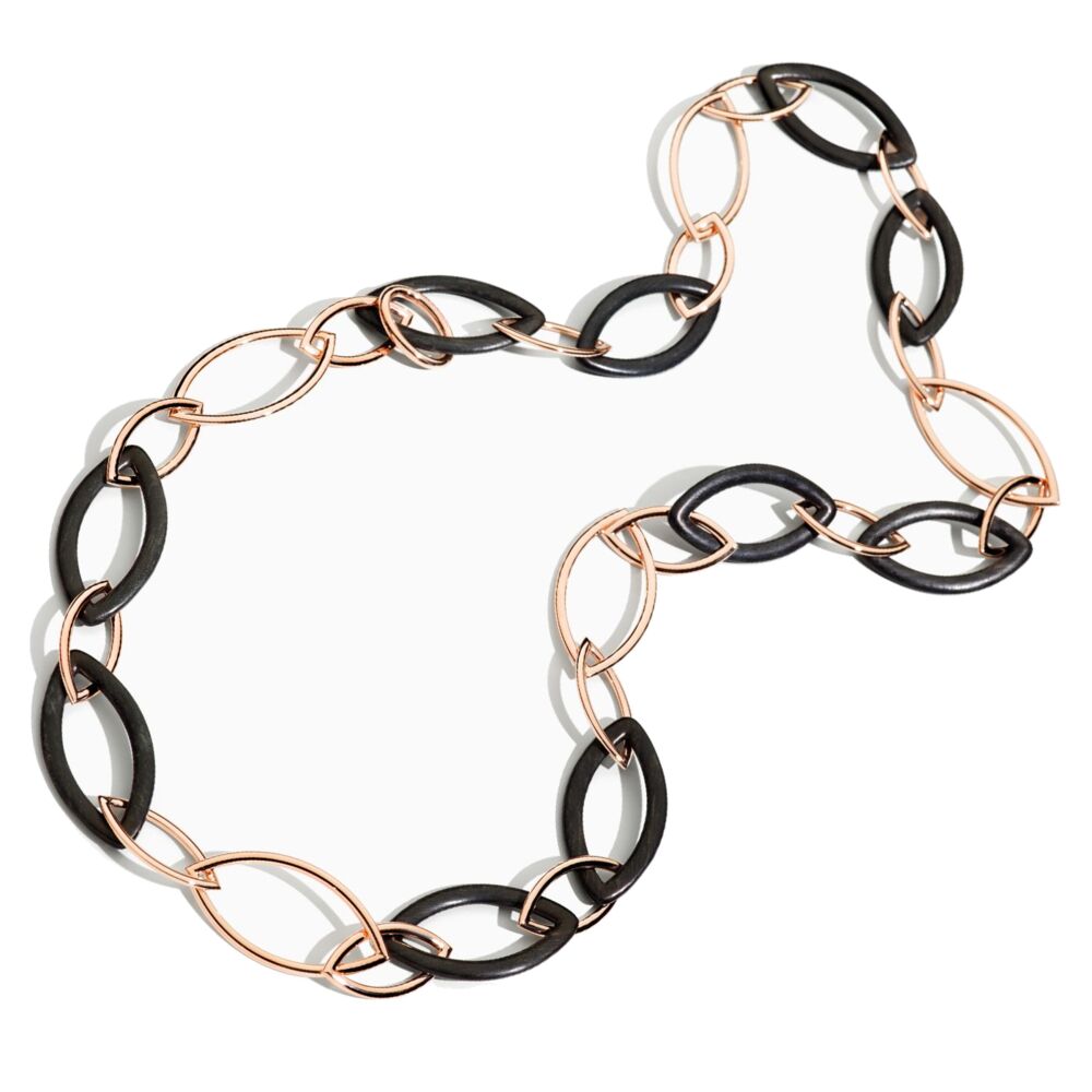Architecturally interesting, versatile necklace which can be worn a variety of ways - this necklace will soon be a favorite. Handcrafted in Italy with Ebony wood and 18k rose gold, these marquis links fit together to create dimension. Not a heavy necklace, it won't weigh you down but will still feel luxurious with the ample amount of gold. Wear as a lariat, doubled, long or 2 tiered; this necklace has a hidden clasp which hinges to allow for placement anywhere on the chain. <div style="position: initial; margin: initial;"><br></div><ul style="position: initial; margin: initial;"><li style="position: initial; margin: initial;">Take 25% off with Code: VHERNIER25</li><li style="position: initial; margin: initial;">In Stock</li></ul> Chain Rose Gold Ebony with Clasp