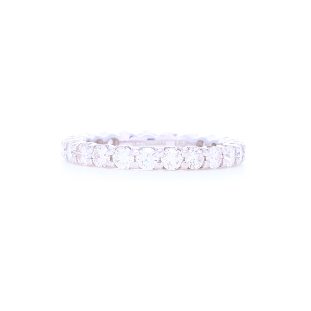 This 14k white gold eternity ring has 2 carats of brilliant cut round diamonds set in a size 8 configuration. A perfect edition to any stack ring set or symbolize an April birthstone for yourself of family. Shared Prong Brilliant Cut Diamond Eternity Ring