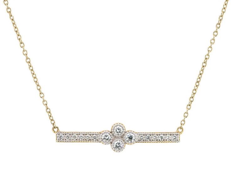 This 18k yellow gold bar necklace features a diamond gold bar connected on both sides to a gold chain. The total diamond carat weight is .22 carats. Making this a perfect everyday necklace. Provence Bar Necklace