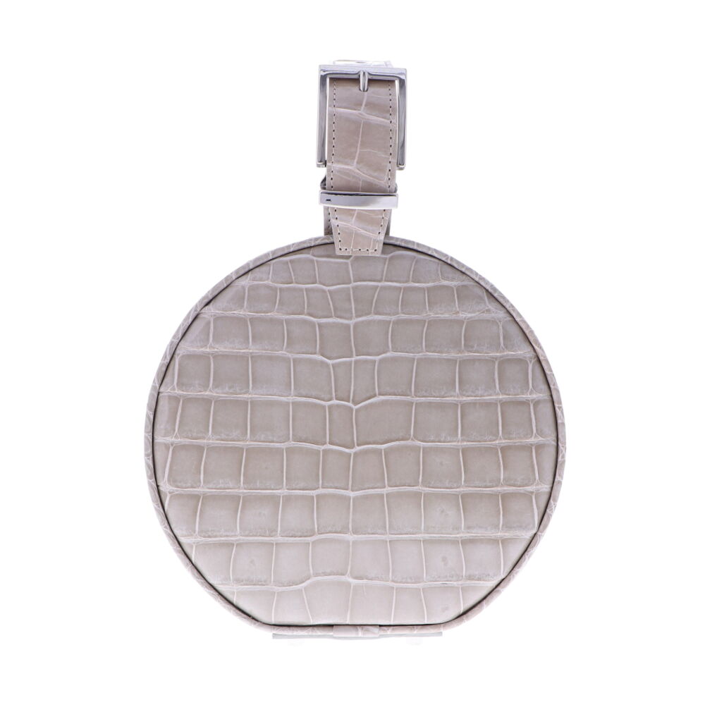 LaNae's Hat Box Chain Bag has been crafted out of genuine American Alligator with a premium High Gloss Beige finish. Due to the premium quality of each high gloss skin our 3rd generation artisans are required to hand stitch each bag. As always our hardware is the finest Italian Palladium and each interior has been lined with a Garment Quality Suede which keeps each bag light yet durable. Proudly crafted in the United States. Beige Alligator Hat Box Chain Bag